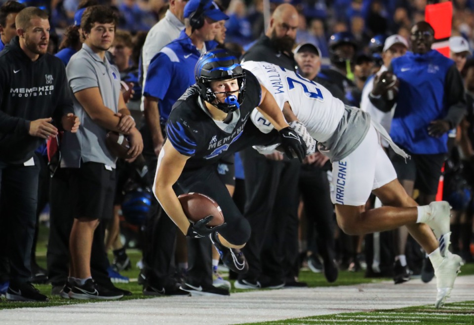 <strong>University of Memphis tight end Caden Prieskorn (86) gets dragged out of bounds on Nov. 10, 2022, in the game against the University of Tulsa.</strong> (Patrick Lantrip/Daily Memphian)