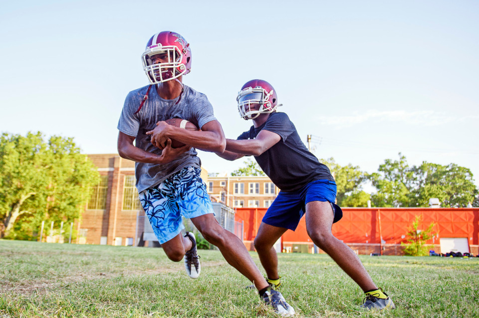 <strong>MASE quarterback Demetrius Visor hands the ball off to MASE running back Kumaro Brown during practice on Thursday July, 24 2022 in Memphis.</strong> (Justin Ford/Special to Daily Memphian)