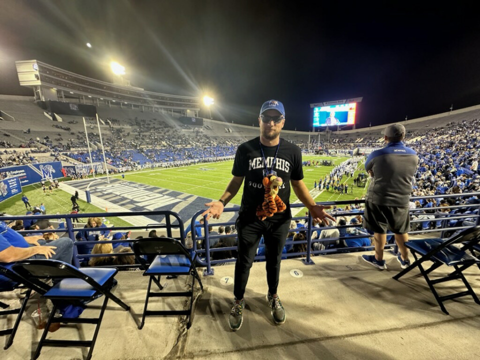 <strong>College football fan Ben Chase is on a journey to visit 70 football stadiums this football season. The Memphis vs. Tulsa on Nov. 10, 2022, at Simmons Bank Liberty Stadium, was No. 46 for Chase.</strong> (Courtesy Ben Chase)