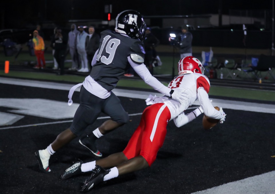 <strong>Germantown receiver Israel Tate (13) almost hauls in a touchdown during the Nov. 11, 2022, game against Houston.</strong> (Patrick Lantrip/Daily Memphian)