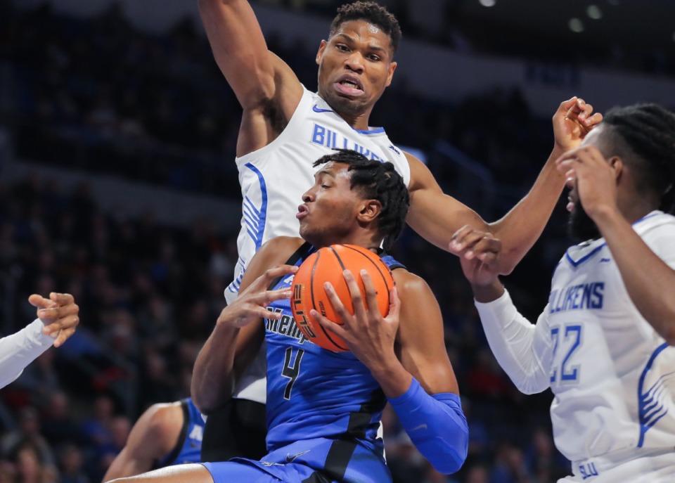 <strong>University of Memphis forward Chandler Lawson (4) fights for a rebound during the Nov. 15, 2022, game against Saint Louis.</strong> (Patrick Lantrip/Daily Memphian)