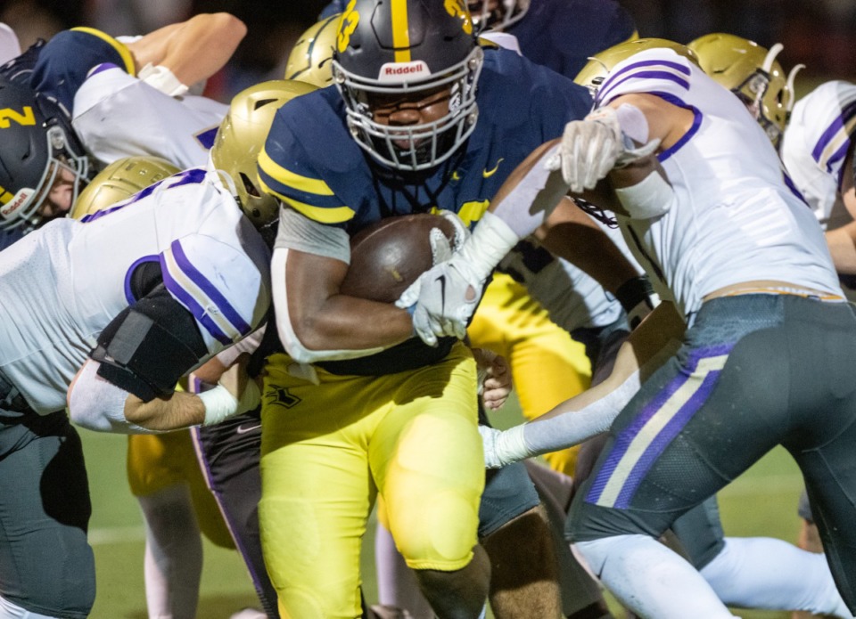 <strong>Lausanne running back Tyler Wilson named&nbsp;Offensive Most Valuable Player. He&nbsp;drives up the middle with a host of Nashville&rsquo;s Christ Presbyterian Academy defenders in the Division II, Class AA playoff game at Lausanne, Friday, Nov. 11. CPA ended Lausanne's season by winning 21-13.</strong> (Greg Campbell/Special for The Daily Memphian file)