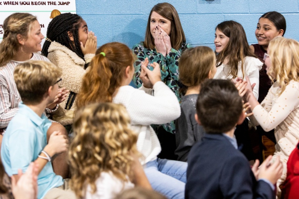 <strong>Alexa Guynes, a teacher at Dogwood Elementary School, reacts during a surprise announcement on Nov. 17, 2022 that she&rsquo;s the only teacher in Tennessee to receive a $25,000 award from the Milken Family Foundation to use however she deems appropriate.</strong> (Brad Vest/The Daily Memphian)