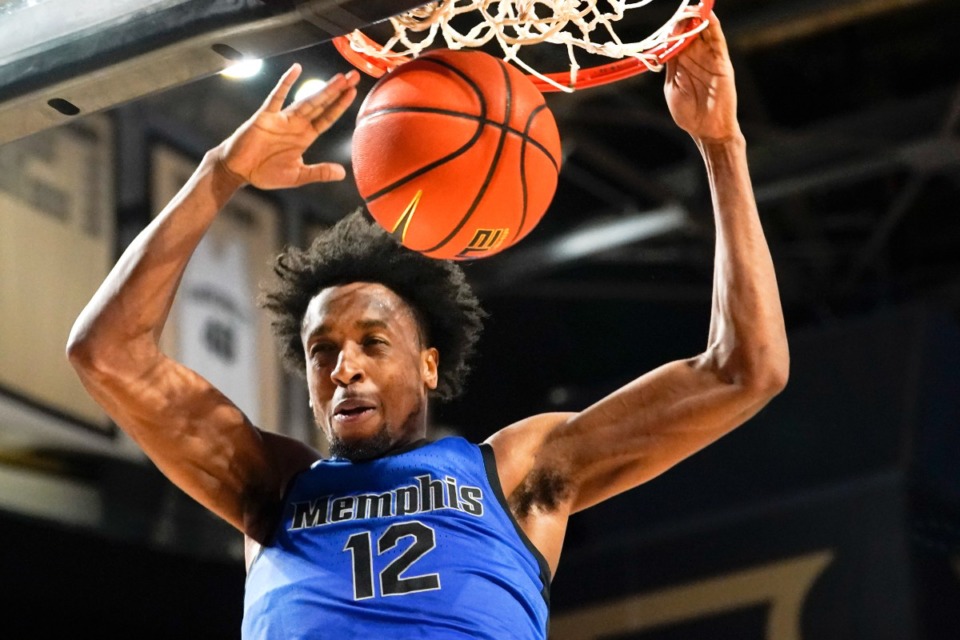 <strong>Memphis forward DeAndre Williams dunks against Vanderbilt in the first half of an NCAA college basketball game Monday, Nov. 7, 2022, in Nashville.</strong> (Mark Humphrey/AP file)