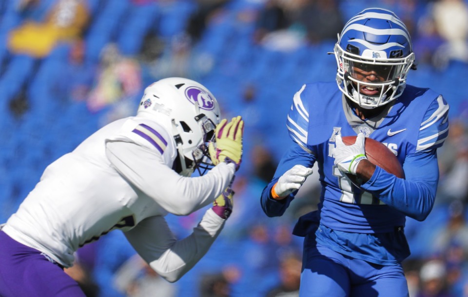 <strong>University of Memphis receiver Eddie Lewis (18) tries to dodge a defender during a Nov. 19, 2022 game against North Alabama.</strong> (Patrick Lantrip/The Daily Memphian)