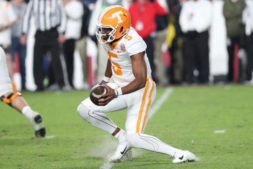<strong>Tennessee quarterback Hendon Hooker suffers an injury while making a cut during the second half of the team's NCAA college football game against South Carolina on Saturday, Nov. 19, 2022, in Columbia, S.C. Hooker left the game.</strong> (Artie Walker Jr./AP)