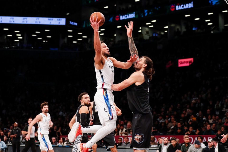<strong>Memphis Grizzlies center Steven Adams (4) blocks Brooklyn Nets guard Ben Simmons during the first half of an NBA basketball game Sunday, Nov. 20, 2022, in New York.</strong> (Eduardo Munoz Alvarez/AP)