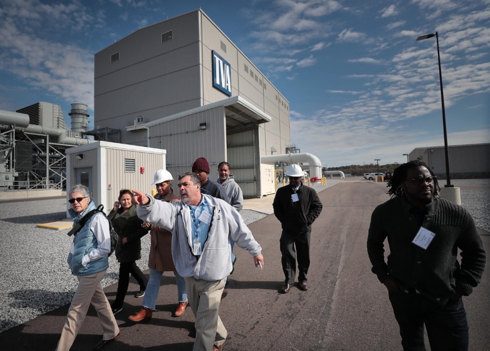 <strong>TVA employees will get&nbsp;$161 million in &ldquo;winning performance&rdquo; payments for meeting goals for the last fiscal year. TVA maintenance coordinator George Czeiszperger (center) leads a tour of the new Allen Combined Cycle Plant in southwest Memphis for a group of MLGW employees in 2018 after a formal opening ceremony for the natural gas power plant.</strong> (Jim Weber/The Daily Memphian file)