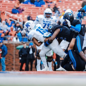 <strong>Memphis running back Sutton Smith carries the ball during the Saturday, Nov. 26 game between the Memphis Tigers and the SMU Mustangs at Gerald J. Ford Stadium in Dallas.</strong> (Courtesy Memphis Athletics)