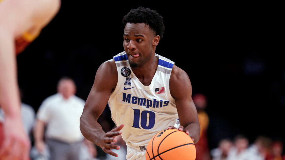 <strong>Memphis guard Alex Lomax drives against Iowa State during the first half of an NCAA college basketball game in the NIT Season Tip-Off tournament on Nov. 26, 2021, in New York.</strong> (Adam Hunger/AP file)