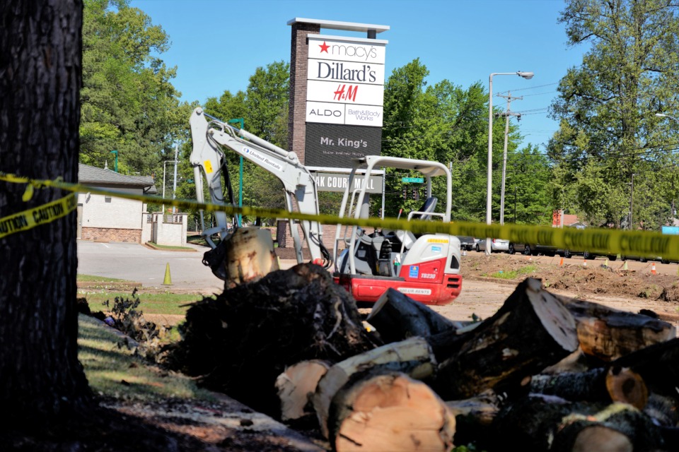 <strong>Oak Court Mall may receive a code citation for cutting down, without permission, 10 mature trees that lined Poplar Avenue. The trees were cut down so motorists could see the mall's new, larger sign that features electronic messaging.&nbsp;</strong>(Tom Bailey/Daily Memphian)&nbsp;