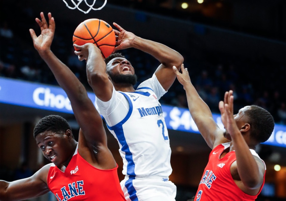 <strong>Memphis Tigers guard Alex Lomax (middle) drives to the basket against Lane College during action on Sunday, Oct. 30, 2022.</strong> (Mark Weber/The Daily Memphian file)