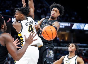 <strong>Memphis Tigers forward DeAndre Williams (right) makes a pass around VCU defender Jalen DeLoach (left) during action on Sunday, November 20, 2022.</strong> (Mark Weber/The Daily Memphian)