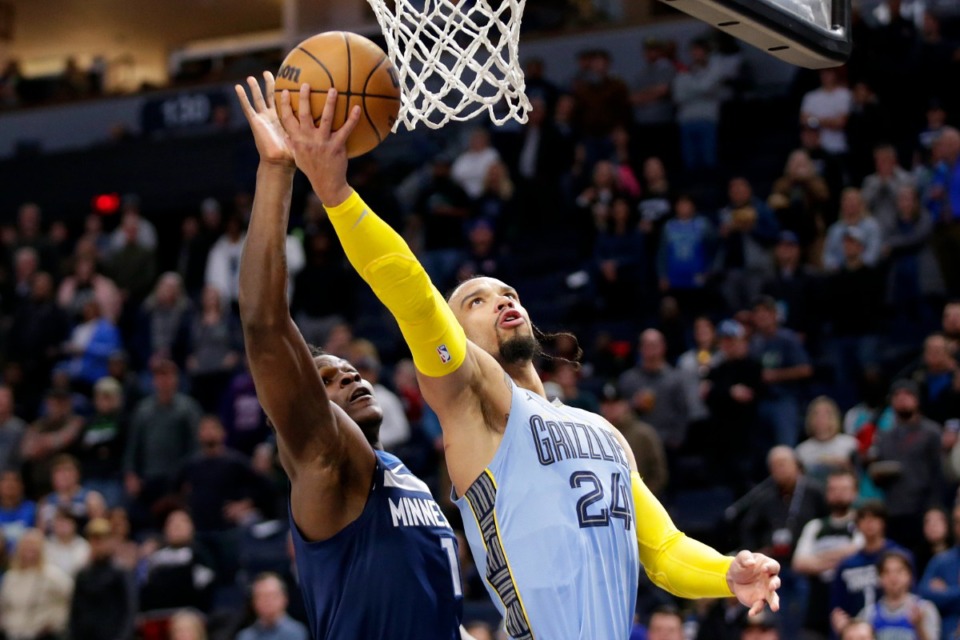 <strong>Memphis Grizzlies forward Dillon Brooks (24) shoots in front of Minnesota Timberwolves guard Anthony Edwards (1) on Wednesday, Nov. 30, 2022, in Minneapolis.</strong> (Andy Clayton-King/AP)
