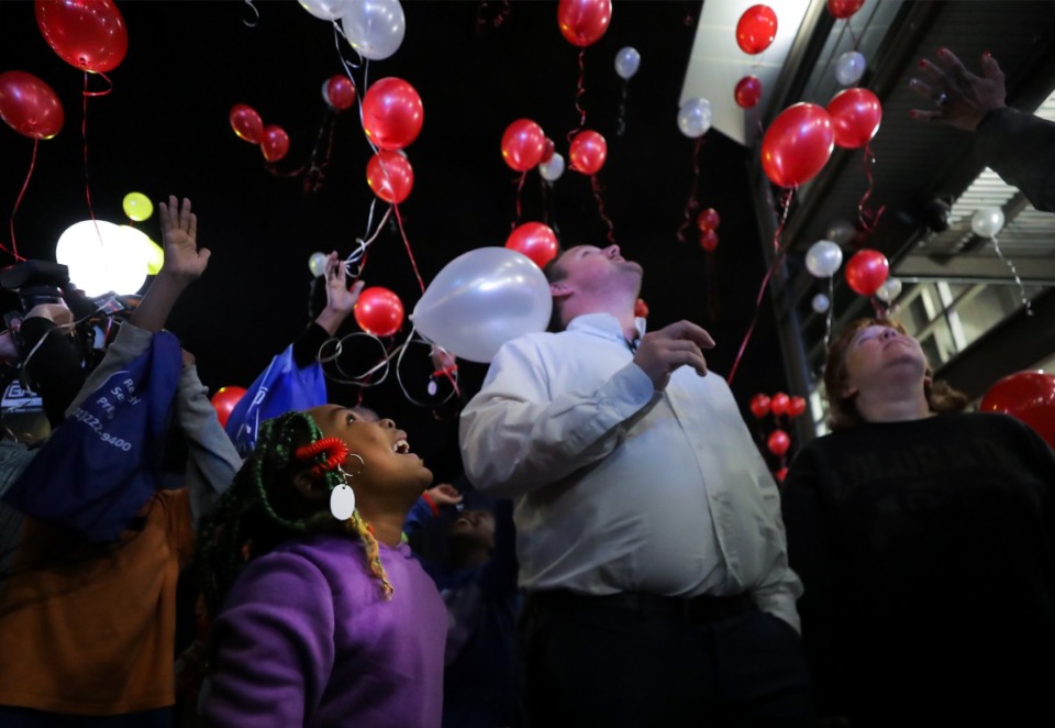 <strong>Jaliyah Williams smiles as balloons are released for the Shelby County Health Department's annual World AIDS Day event at FedExForum on Dec. 1, 2022.</strong> (Patrick Lantrip/The Daily Memphian)