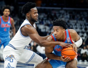 <strong>Memphis Tigers defender Alex Lomax (left) guards Ole Miss guard Matthew Murrell (right) on Saturday, Dec. 3, 2022.</strong> (Mark Weber/The Daily Memphian)