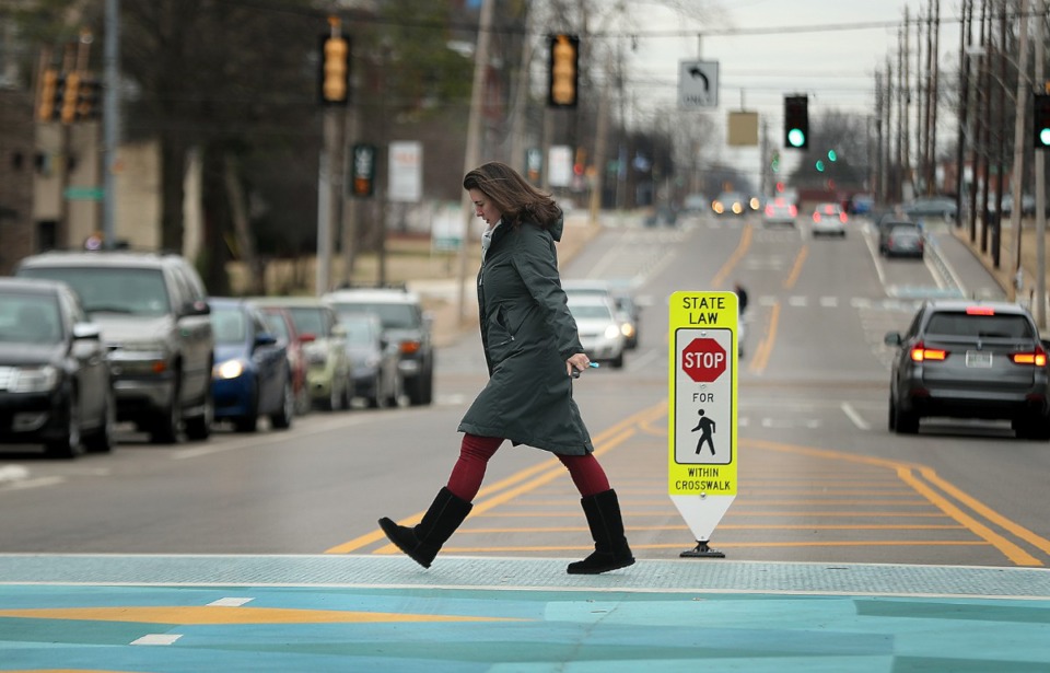 <strong>A pedestrian crosses Manassas Street. Memphis has seen increasing pedestrian deaths in the past decade.</strong> (Patrick Lantrip/The Daily Memphian file)