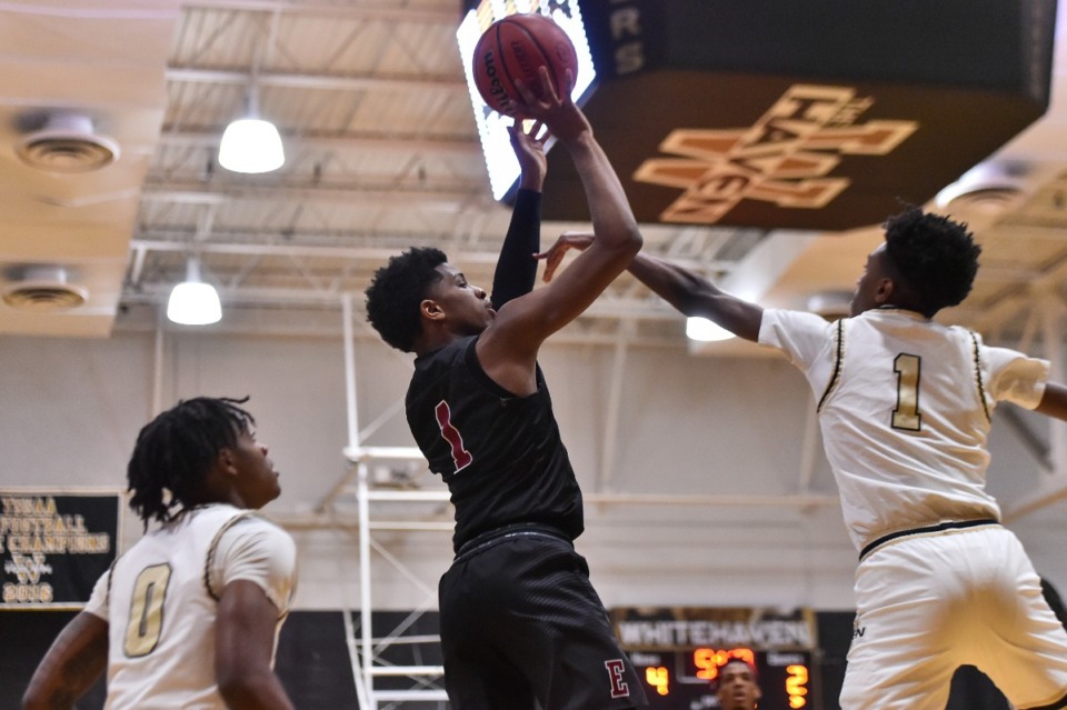 <strong>East&rsquo;s Jamarion Harvey (1) shoots over Whitehaven&rsquo;s Christopher Brunt (1)&nbsp;on Jan 4, 2022.</strong> (Justin Ford/Special to The Daily Memphian file)