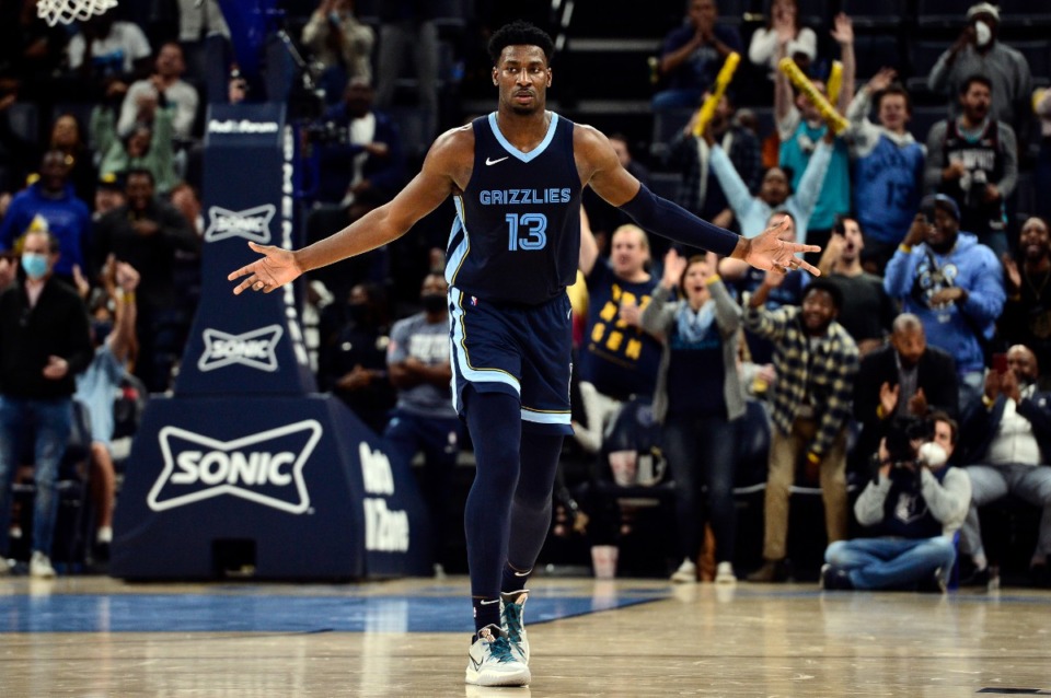 <strong>Memphis Grizzlies forward Jaren Jackson Jr. (13) reacts after scoring a three-point basket in the second half of an NBA basketball game against the Minnesota Timberwolves, Monday, Nov. 8, 2021, in Memphis, Tenn.</strong> (AP Photo/Brandon Dill)