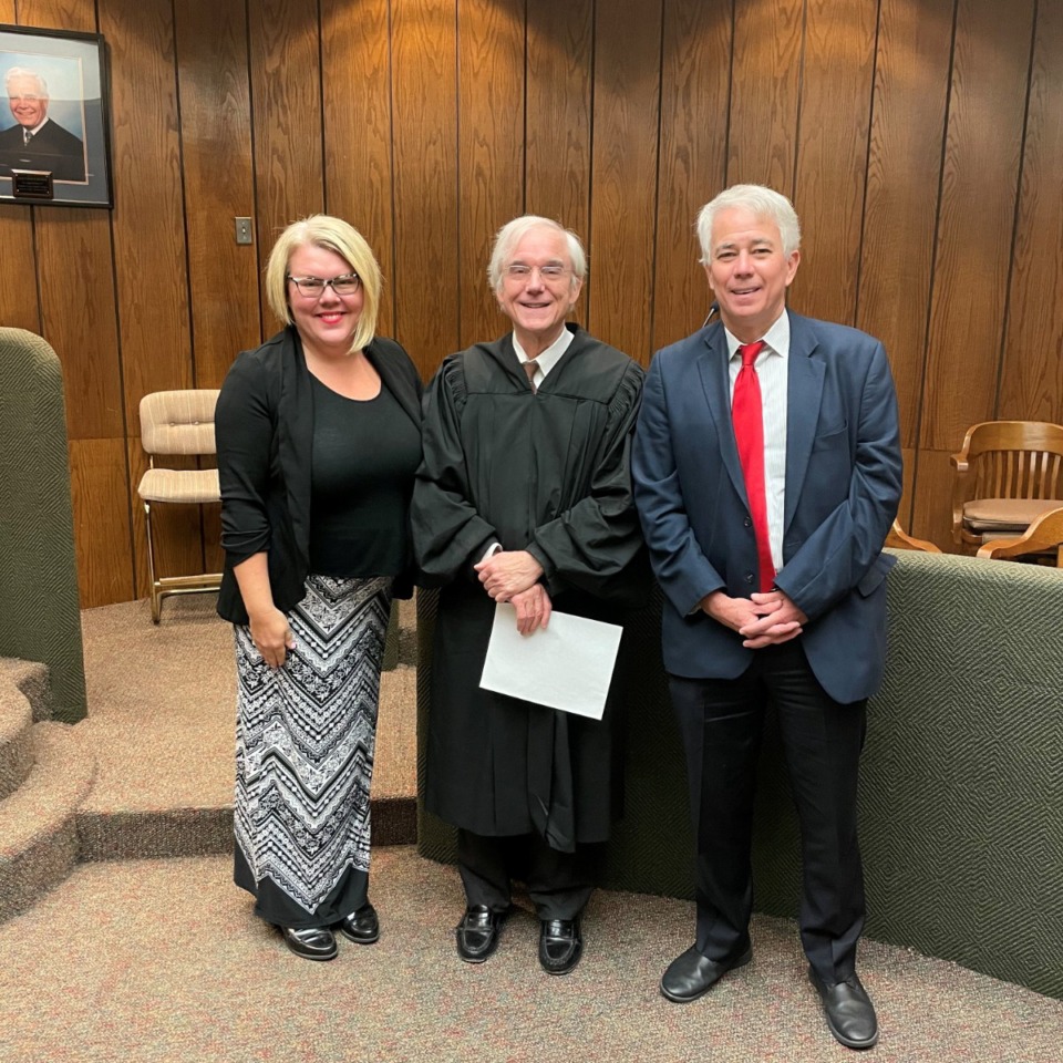 <strong>Monica Timmerman (left) was arrested Wednesday, Dec. 7 and charged with DUI. She was hired in mid-November and is pictured with Criminal Court Judge Chris Craft (center) and Steve Mulroy.&nbsp;</strong>(Courtesy Shelby County District Attorney&rsquo;s Office)