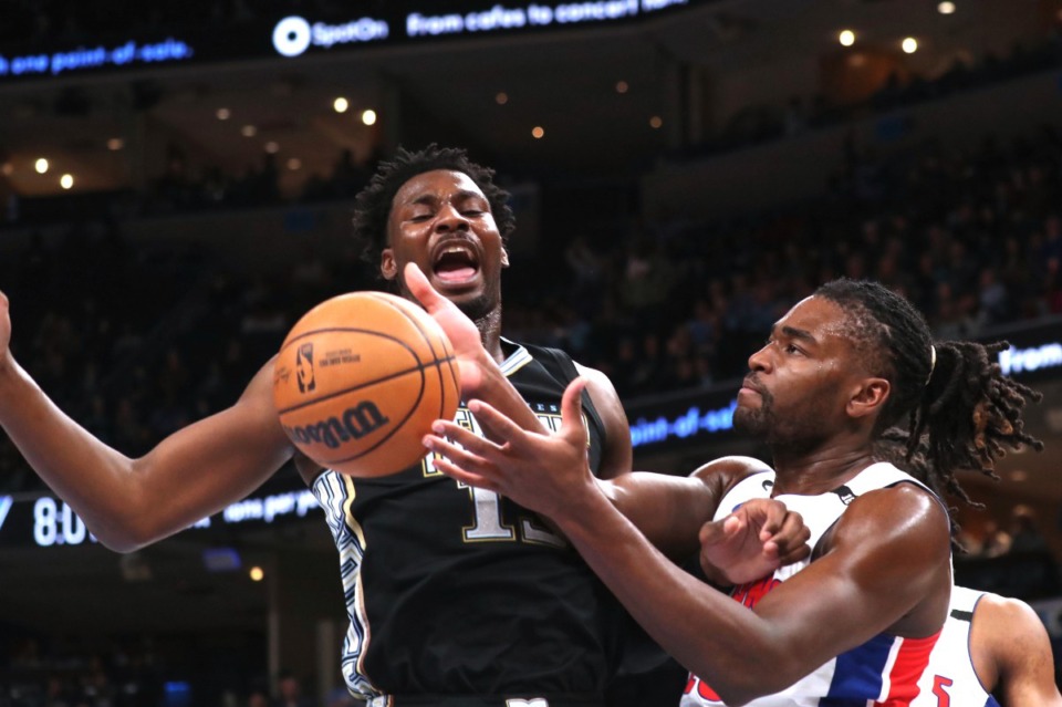 <strong>Memphis Grizzlies forward Jaren Jackson Jr. (13) vies for a rebound with Detroit Pistons forward Isaiah Stewart, right, on Dec. 9, 2022. He led the Grizzlies with 20 points.</strong>&nbsp;(Nikki Boertman/AP)