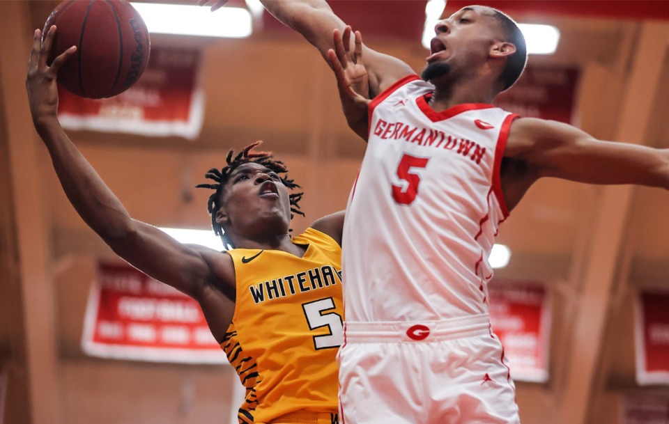 <strong>Whitehaven guard Julius Thedford (5) goes for a layup on Dec. 9, 2022, in the game against Germantown.</strong> (Patrick Lantrip/The Daily Memphian)