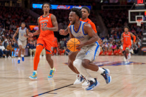 <strong>Memphis guard Alex Lomax, front right, makes a play against Auburn guard Allen Flanigan (22) during the second half of an NCAA college basketball game on Saturday, Dec. 10, 2022, in Atlanta.</strong> (AP Photo/Erik Rank)