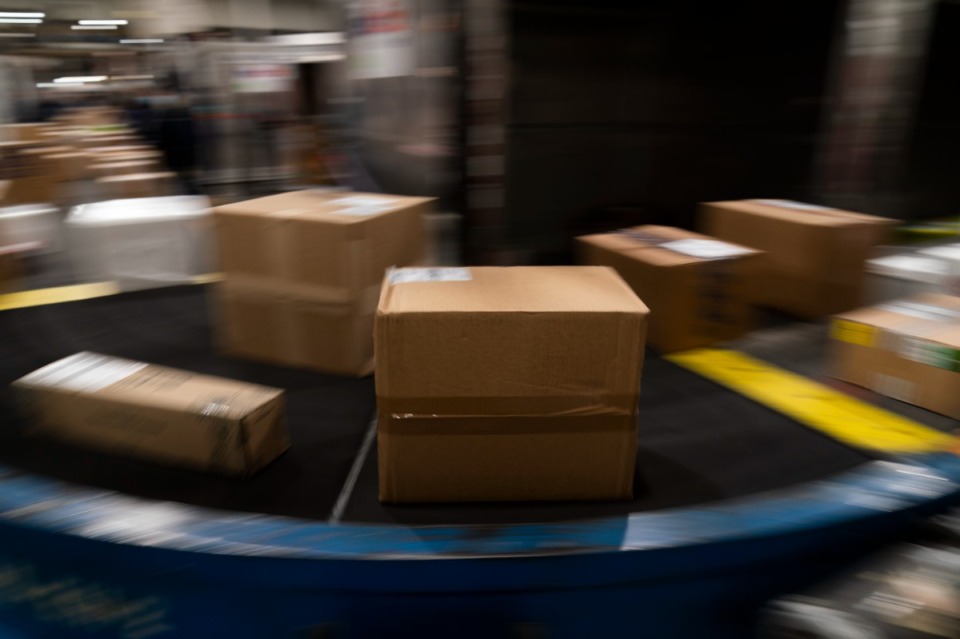 <strong>Packages move along a conveyor belt while being sorted for delivery at the FedEx regional hub at the Los Angeles International Airport in Los Angeles, Tuesday, Dec. 7, 2021</strong>. (AP Photo/Jae C. Hong, File)