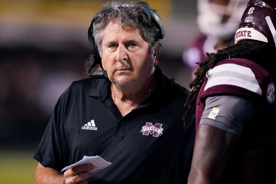 <strong>Mississippi State football coach Mike Leach who helped revolutionize the passing game in college football has died following complications from a heart condition, Mississippi State said Tuesday, Dec. 13, 2022. He was 61.</strong> (AP Photo/Rogelio V. Solis, File)