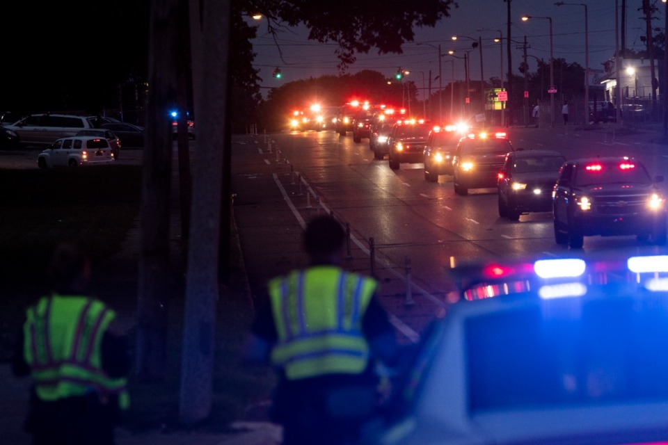 <strong>Emergency vehicles make their way along E.H.Crump Boulevard during the Memphis Fire Department&rsquo;s Sea of Red event honoring firefighter David Pleasant on Sunday evening, Aug. 22. The event started at Tiger Lane and ended at Fire Station 8 on Mississippi Boulevard.</strong> (Brad Vest/Special to The Daily Memphian)