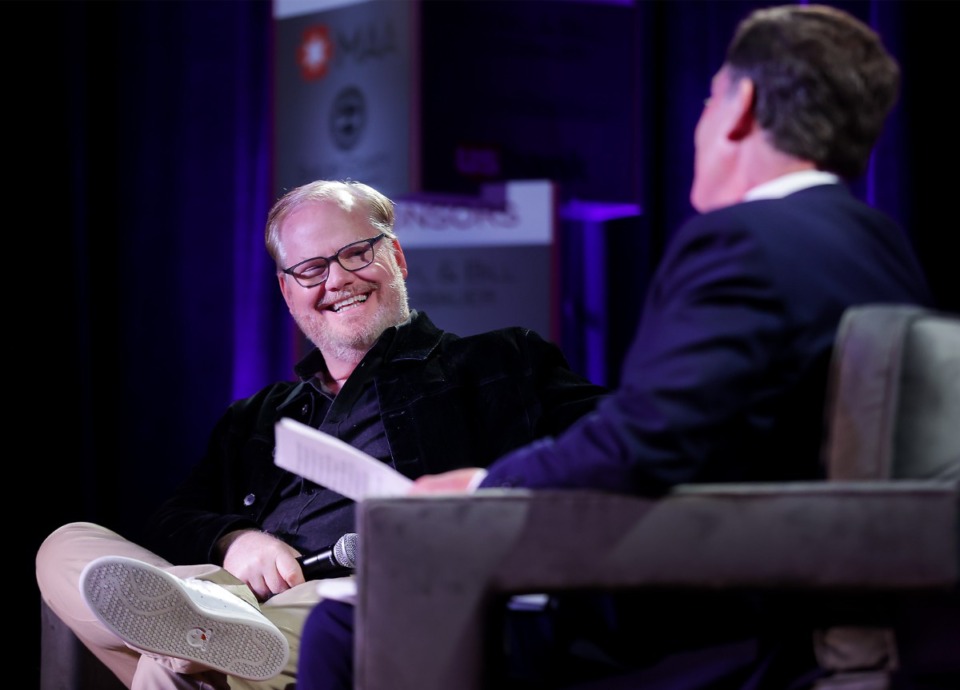 <strong>Comedian Jim Gaffigan laughs with Joe Birch at the Methodist Foundation's annual luncheon Friday, Dec. 16, 2022.</strong> (Patrick Lantrip/The Daily Memphian)