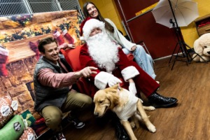 <strong>Jack Alberts (left) and Nicole Ungaro pose with Lily, and Santa at Hollywood Feed on Union Avenue on Sunday, Dec. 18.</strong> (Brad Vest/Special to The Daily Memphian)