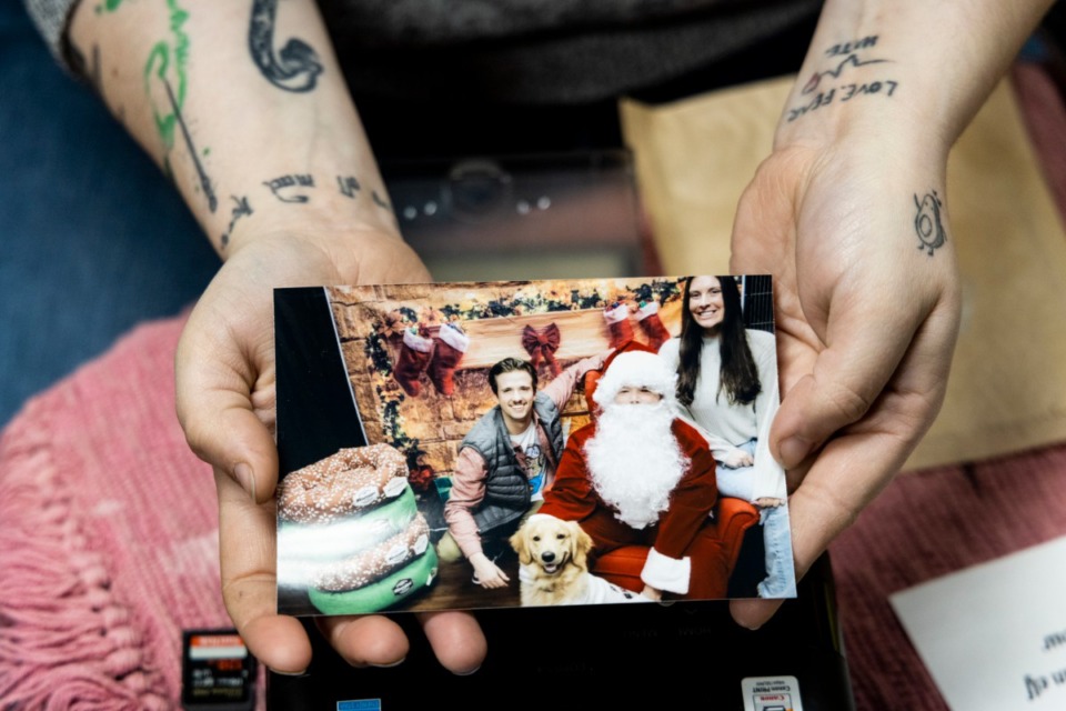 <strong>Jack Alberts (left) and Nicole Ungaro had their picture taken with Lily and Santa at Hollywood Feed on Union Avenue on Sunday, Dec. 18. The pictures were $10 and all proceeds were split between Furgiven Animal Sanctuary and All 4&rsquo;s Rescue League.</strong> (Brad Vest/Special to The Daily Memphian)