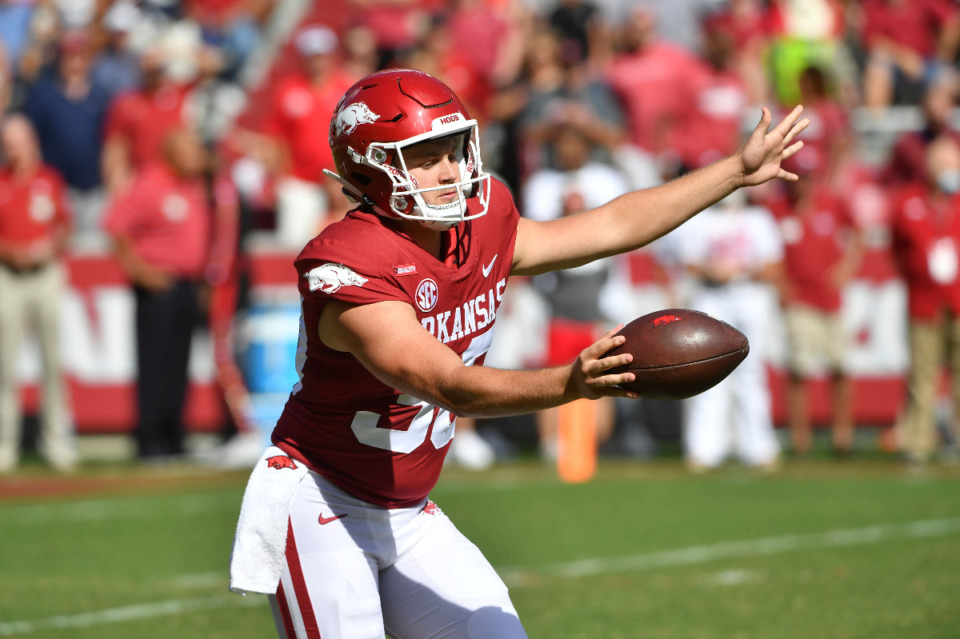<strong>Arkansas punter Reid Bauer (30) kicks against Georgia Southern during the first half of an NCAA college football game Saturday, Sept. 18, 2021, in Fayetteville, Arkansas.</strong> (AP Photo/Michael Woods)