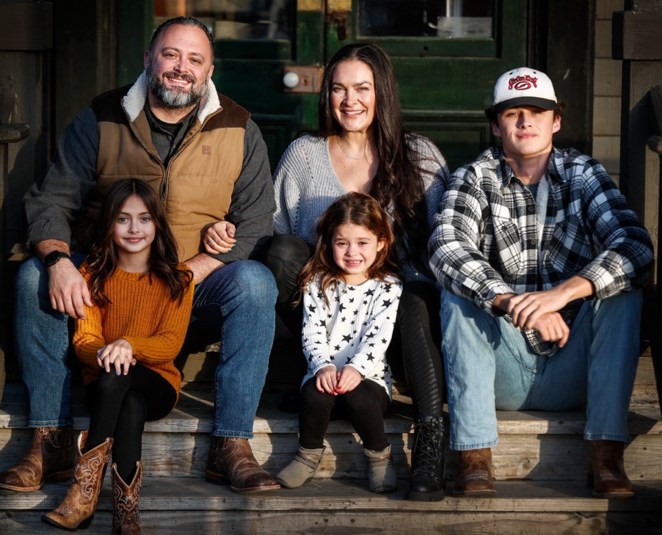 <strong>Brad and Alicia Glover, with their children (left to right) Gemma, Maren and Dylan on Tuesday, Dec. 20, 2022. The couple will soon open The Kitchen Table, at the old Vinegar Jim's Restaurant in Arlington.</strong> (Mark Weber/The Daily Memphian)