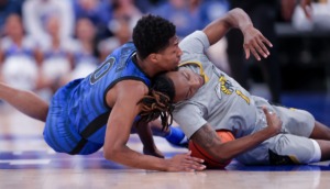 <strong>Memphis Tigers guard Elijah McCadden (0) collides with Alabama State guard Amarr Knox (1) on Dec. 21, 2022.</strong> (Patrick Lantrip/The Daily Memphian)