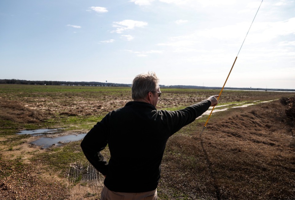 <strong>DeSoto County Supervisor Ray Denison points out an area located off Old Highway 61, on Friday, December 16, 2022, will be the site of the county&rsquo;s first solar farm in Walls, Mississippi.</strong> (Mark Weber/The Daily Memphian)