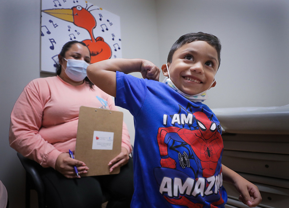<strong>Four-year-old cerebral palsy patient Martin Mejia shows his doctors how well he can flex his muscles. In a partnership with Campbell Clinic, the Cerebral Palsy Care and Research opened in Le Bonheur Children&rsquo;s Hospital in 2018.</strong> (Patrick Lantrip/The Daily Memphian)