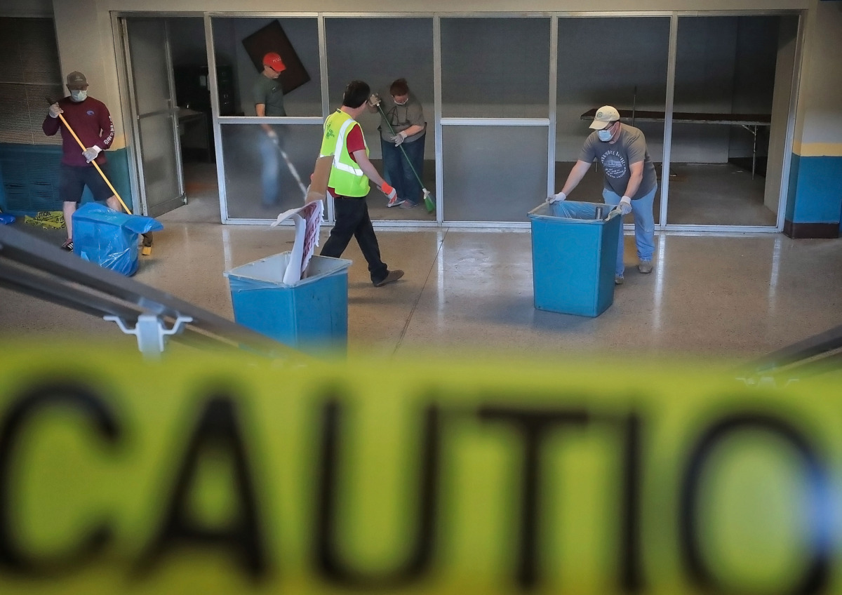 <strong>Volunteers pitch in Saturday, April 27, 2019, to remove debris and clean the Mid-South Coliseum. The Coliseum Coalition and Clean Memphis invited members of the public to assist with the effort.</strong>&nbsp;(Jim Weber/Daily Memphian)