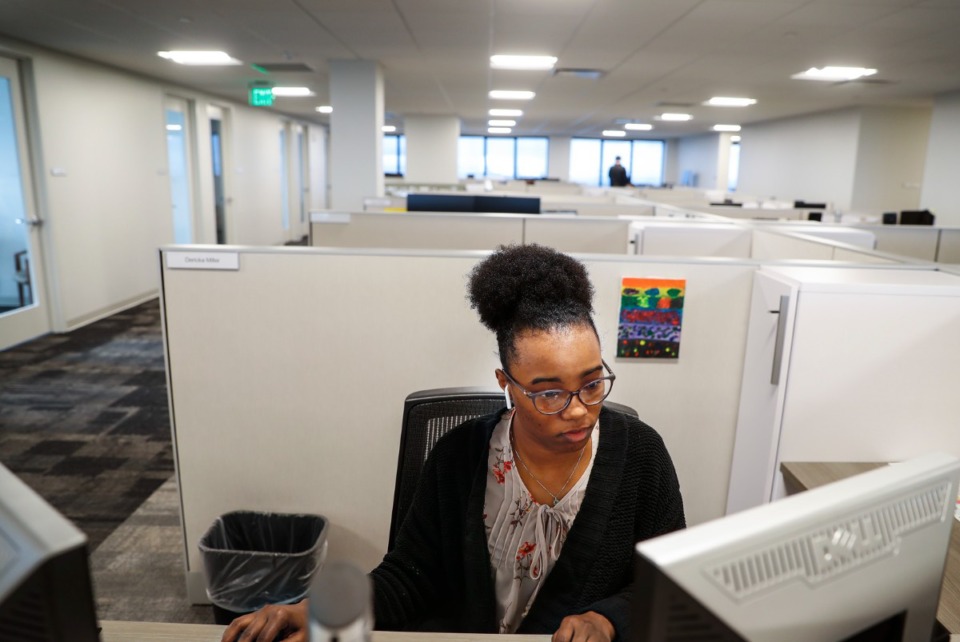 <strong>CBIZ employee Dericka Miller works at her desk on Monday, March 22, 2021. While the Memphis office real estate market has recovered better than others, its outlook is still uncertain.</strong>&nbsp;(Mark Weber/The Daily Memphian file)