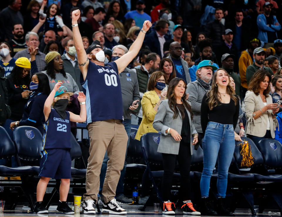 <strong>Memphis Grizzlies fans celebrate a 116-108 victory over the Minnesota Timberwolves on Jan. 13, 2022. The Grizzlies announced that Tuesday&rsquo;s game against Phoenix will be played with fans despite the Memphis water issues.</strong> (Mark Weber/The Daily Memphian file)