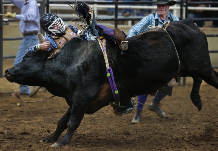 <strong>The ride seems to be getting the best of the riders in the bull-riding competition at the 2022 AutoZone Liberty Bowl Professional Rodeo on Dec. 26, 2022.</strong> (Patrick Lantrip/The Daily Memphian)