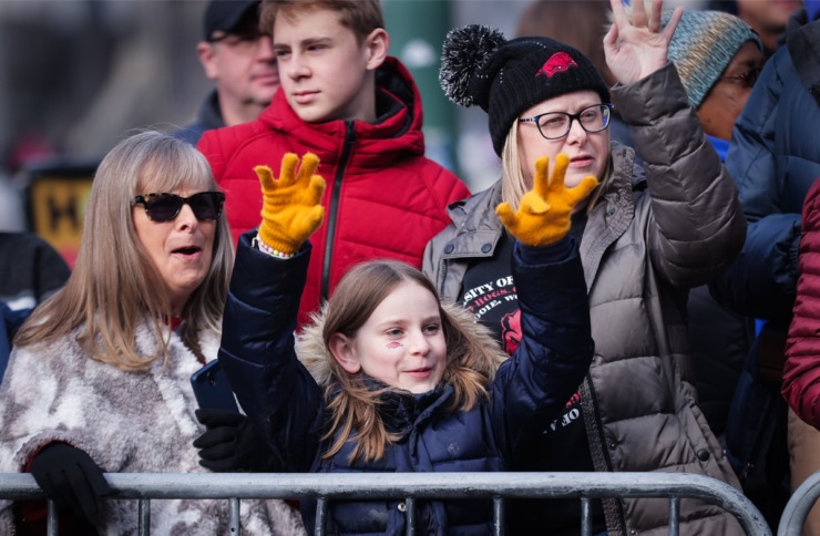 <strong>A young Arkansas fan calls the hogs during the 2022 AutoZone Liberty Bowl Parade on Beale Street on Dec. 27, 2022.</strong> (Patrick Lantrip/The Daily Memphian)