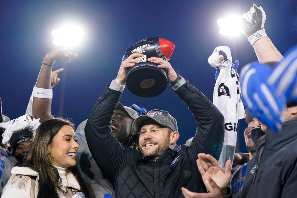 <strong>Memphis head coach Ryan Silverfield lifts the trophy following the First Responder Bowl NCAA college football game against Utah State, Tuesday, Dec. 27, 2022, in Dallas. Memphis won 38-10.</strong> (AP Photo/Sam Hodde)