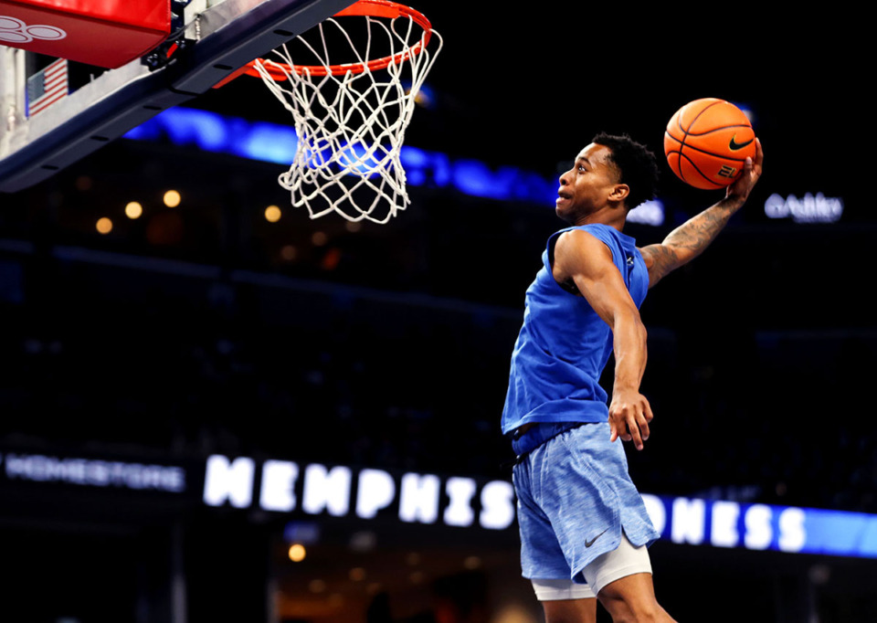 <strong>University of Memphis guard Tyler Harris dunks during a scrimmage at Memphis Madness in FedExForum Oct. 13, 2021.</strong> (Patrick Lantrip/The Daily Memphian file)