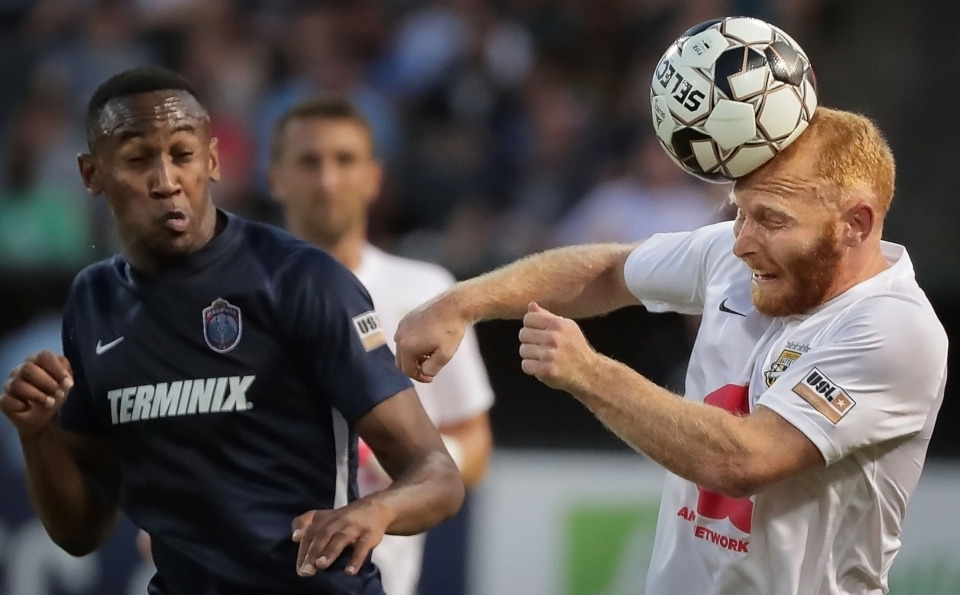 <strong>Charleston's Jay Bolt (right) gets first touch ahead of Rashawn Dally during 901 FC's game against the Charleston Battery on April 27, 2019 at AutoZone Park.</strong> (Jim Weber/Daily Memphian)