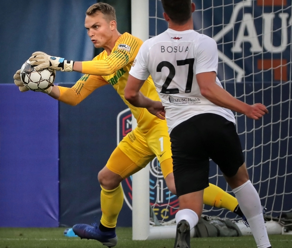 <strong>Goalie Jeff Caldwell picks off a shot attempt during 901 FC's game against the Charleston Battery on April 27, 2019, at AutoZone Park.</strong> (Jim Weber/Daily Memphian)