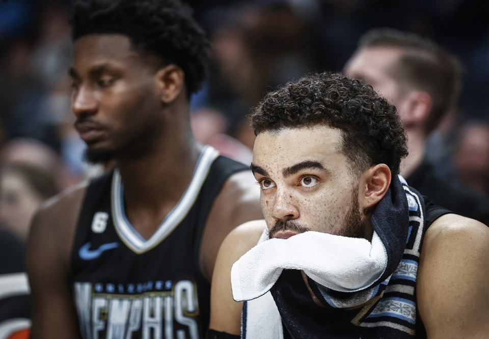 <strong>Memphis Grizzlies teammates Tyus Jones (right) and Jaren Jackson Jr. watch from the bench during a loss to the Phoenix Suns on Tuesday, December 27, 2022.</strong> (Mark Weber/The Daily Memphian)