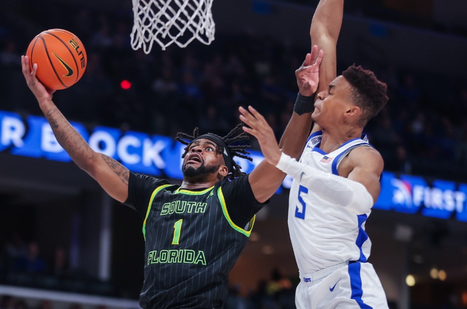 <strong>South Florida guard Selton Miguel (1) goes for a layup on Dec. 29, 2022, in the game against Memphis.</strong> (Patrick Lantrip/The Daily Memphian)