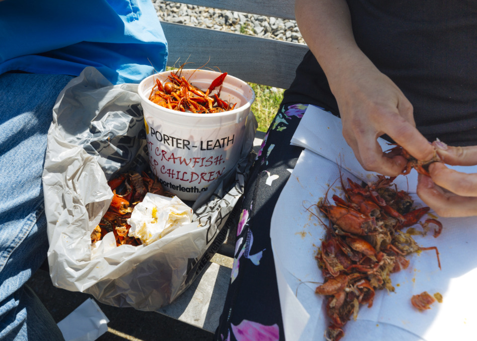 <strong>Festival-goers Philip Hewett and Melody Birdsong eat crawfish at the Rajun Cajun Crawfish Festival in Downtown Memphis.</strong> (Ziggy Mack/Special to the Daily Memphian)